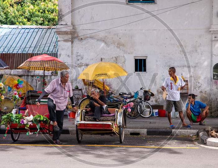 Rickshaw Driver Rest Together At The Street