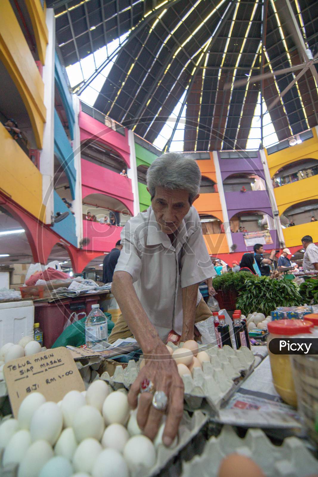 A Man Sell Salted Egg At Pasar Siti Khdijah