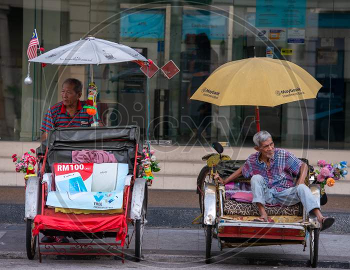 Two Trishaw Driver Rest At Street