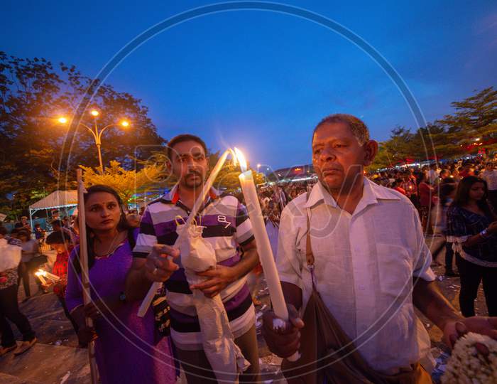 Devotees Light Up Candle During St Anne Feast