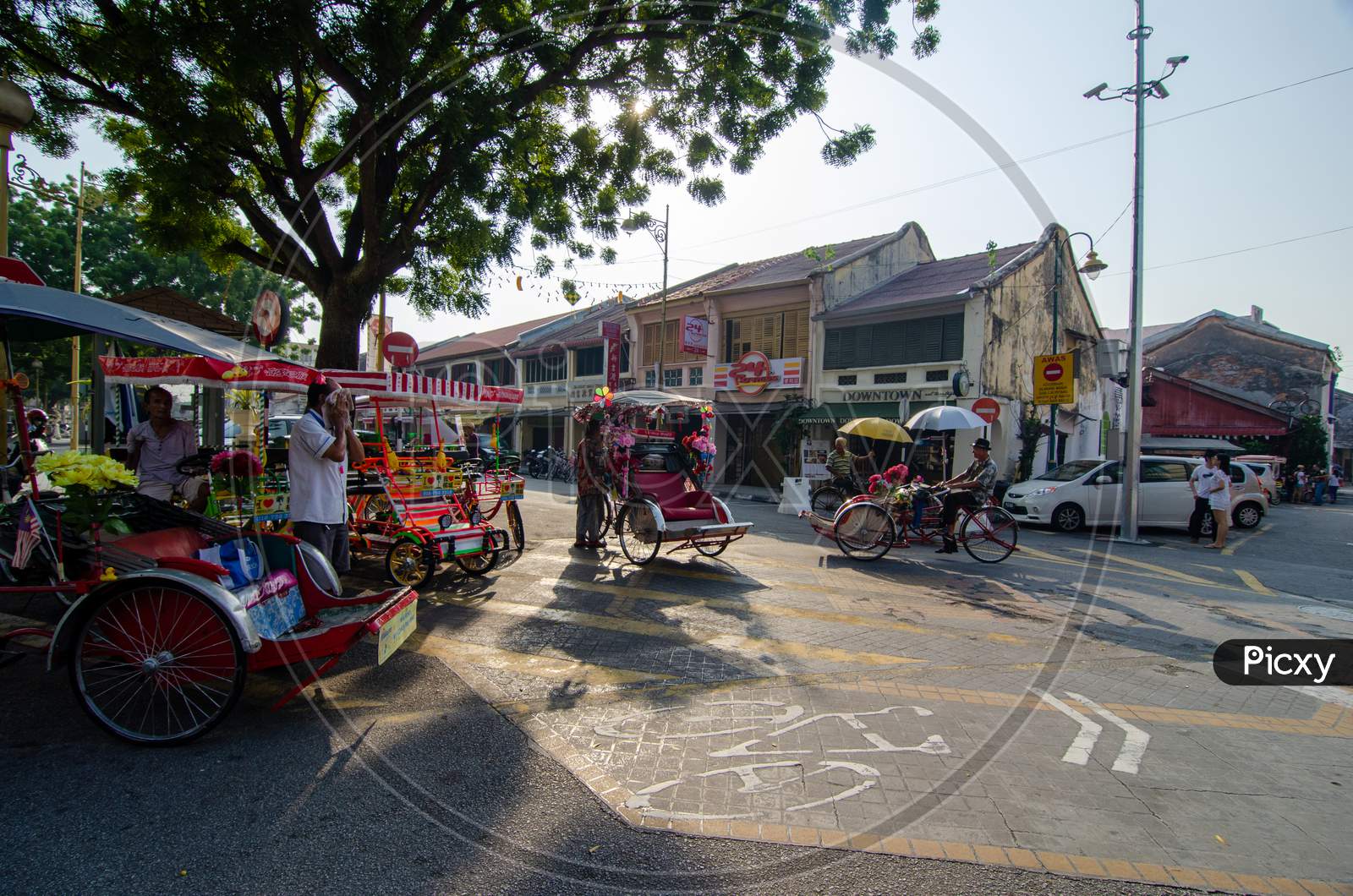 Rickshaw Driver At The Bicycle Friendly Street