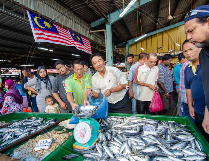 Fish Hawkers Sell Fresh Fish In Market