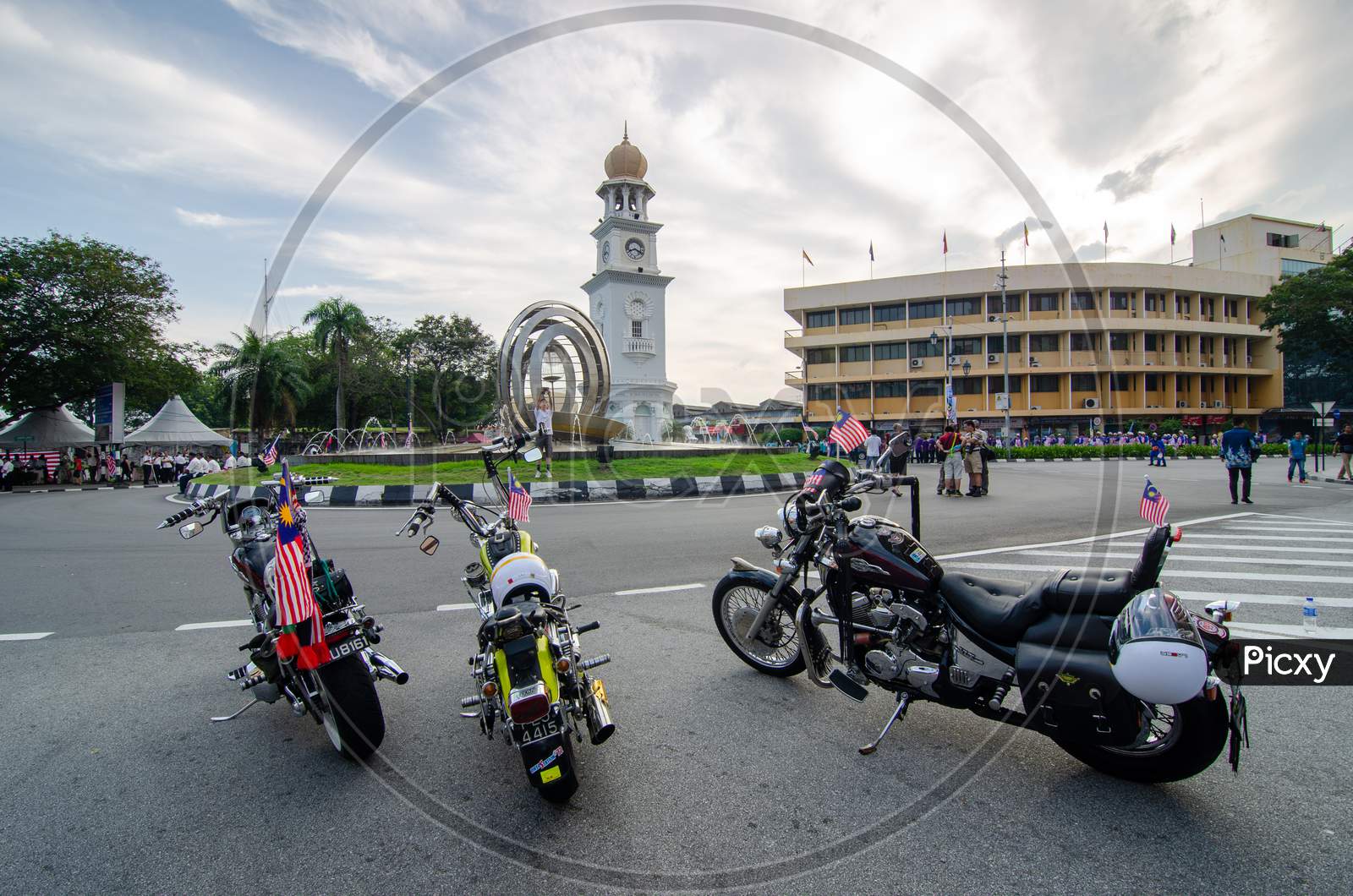 Motorcycle With Malaysia Flag Park In Front Jubilee Clock Tower