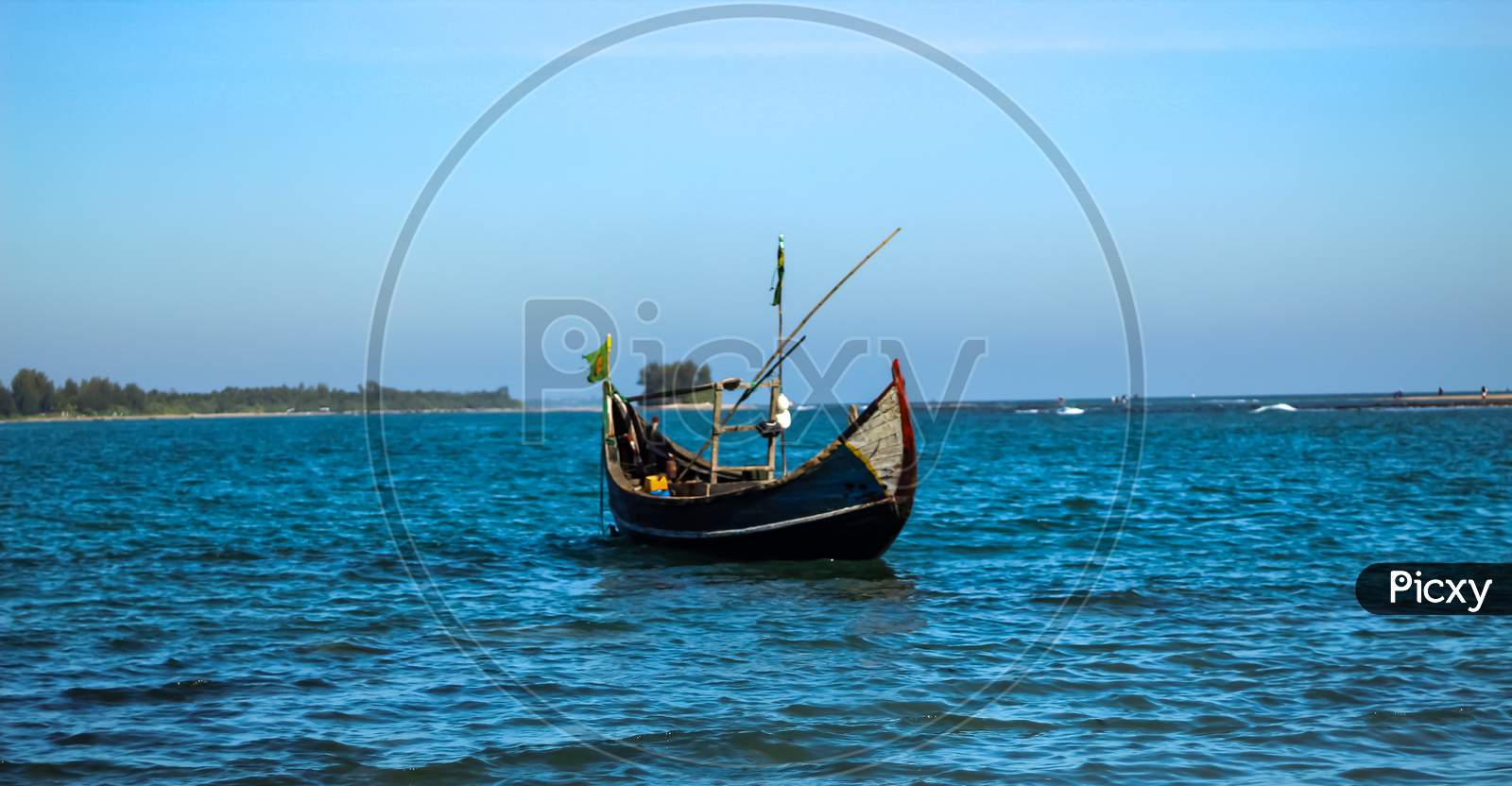 Floating Boat In Blue Sea