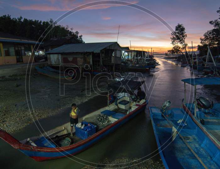 A Local Fisherman Back From Sea During Dusk Hour
