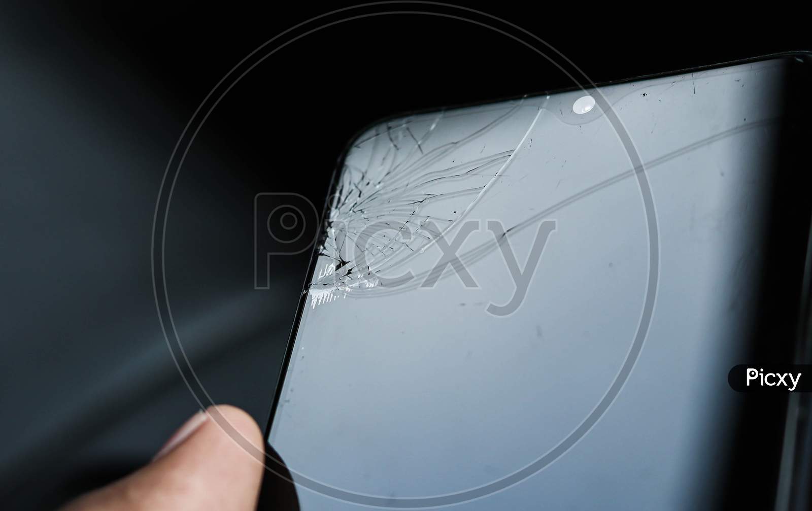 Smartphone monitor damage mock up. Display glass hit. Cellphone crash and scratch