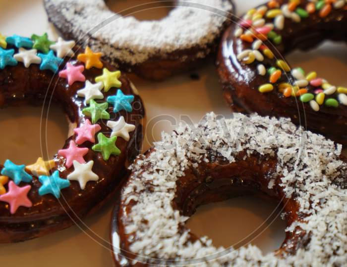 plate of colorful donuts