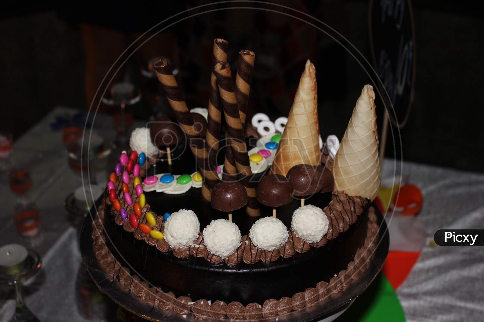 A Beautiful Birthday Cake Made By Chocolate Garnish With Chocolate