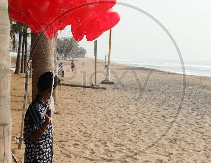 Air Balloon Seller in a Beach