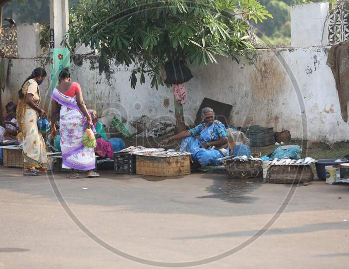 Women Selling Fish at Market