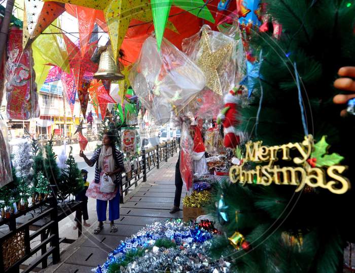 Girls shop for Christmas ahead of celebrations in Guwahati, India on Dec 11,2020