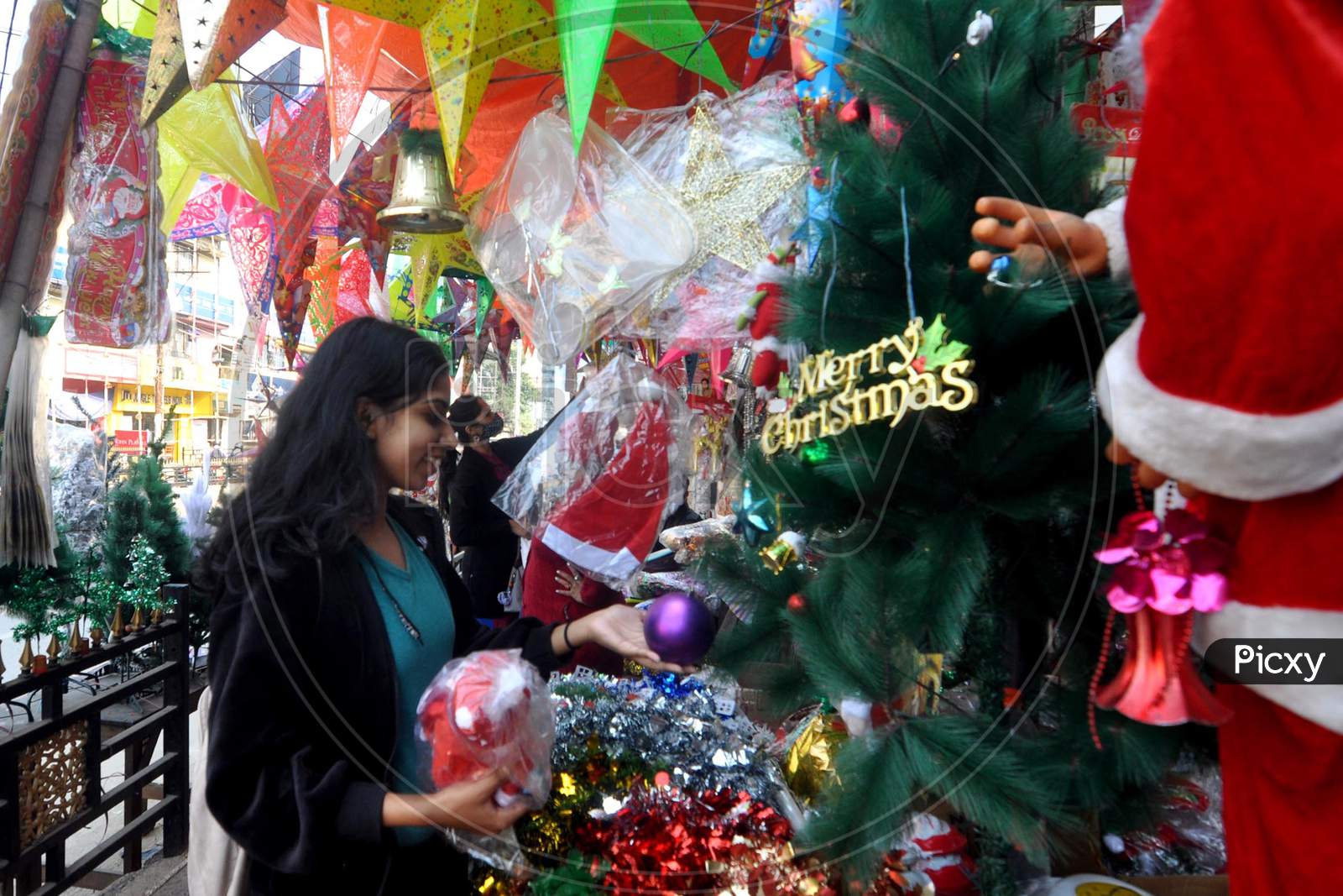 Girls shop for Christmas ahead of celebrations in Guwahati, India on Dec 11,2020