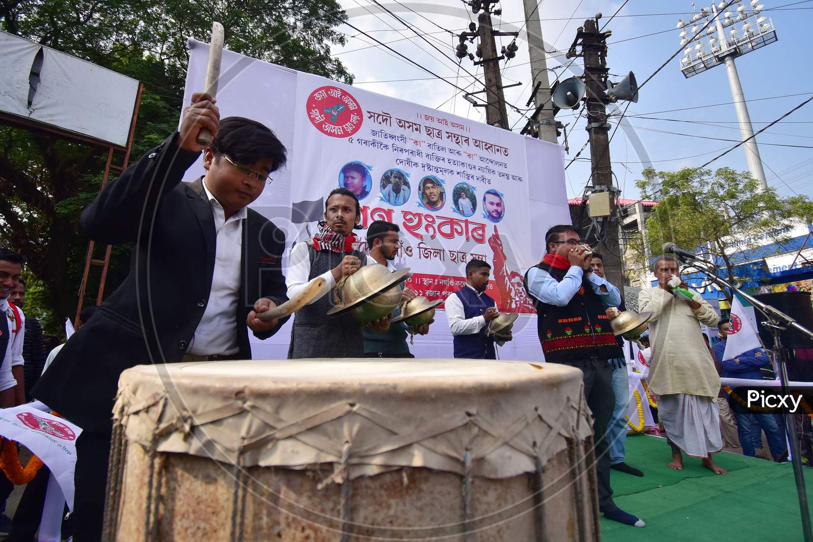 Activist of All Assam Students union (AASU) plays a drum and other instruments during a protest against the Citizenship Amendment Act (CAA), in Nagaon District of Assam, India on Dec 12,2020