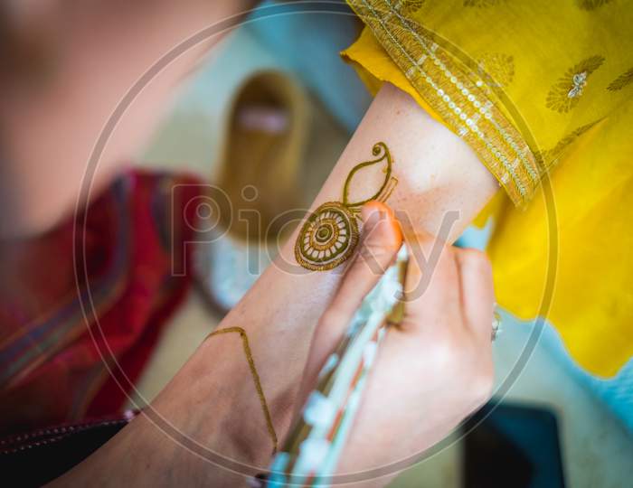 Hand Of An Indian Bride Decorated With Henna Or Mehndi