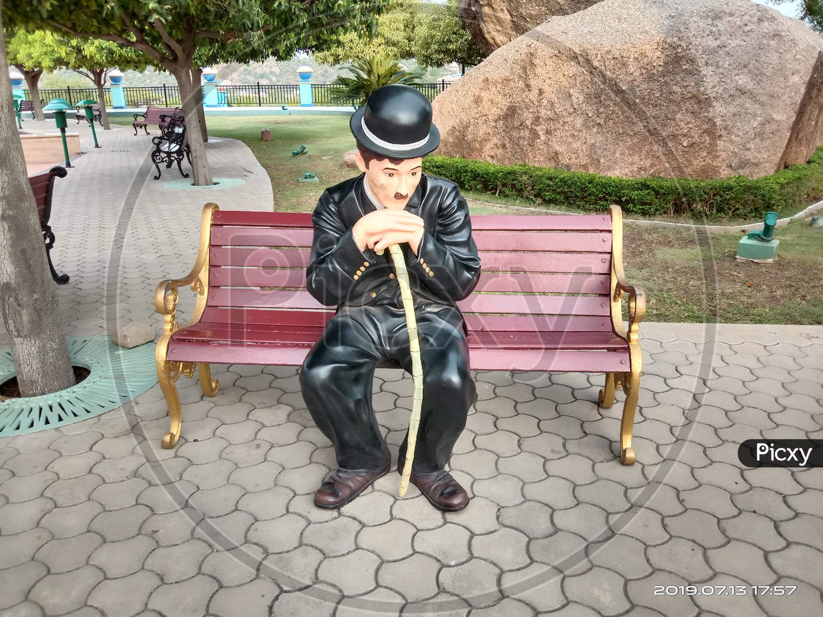 Thinking Man sitting - Charlie Chaplin Statue in Ramoji Film City