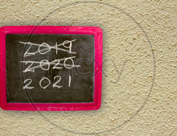 Happy New Year 2021 With The Past Years Crossed Out. Use For New Year 2021 Concept.