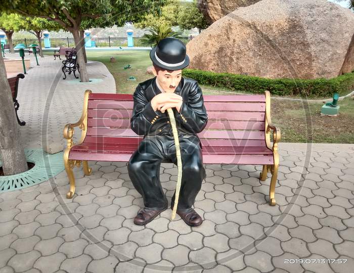 Thinking Man sitting - Charlie Chaplin Statue in Ramoji Film City