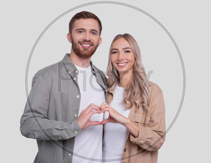 Couple Showing Heart Sign. Couple Standing Showing Love Sign. Relationship, Family, Lovers, Friends Concept