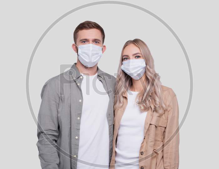 Couple Wearing Medical Mask Isolated. Man And Woman Hugging, Lovers, Friends, Couple, Virus Concept