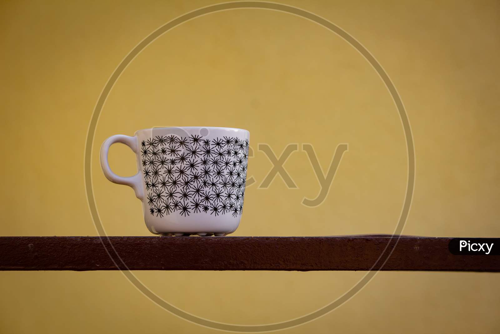 View Of Ceramic Mug Isolated Against Simple Background. Coffee Mug Isolated With Minimalist Design