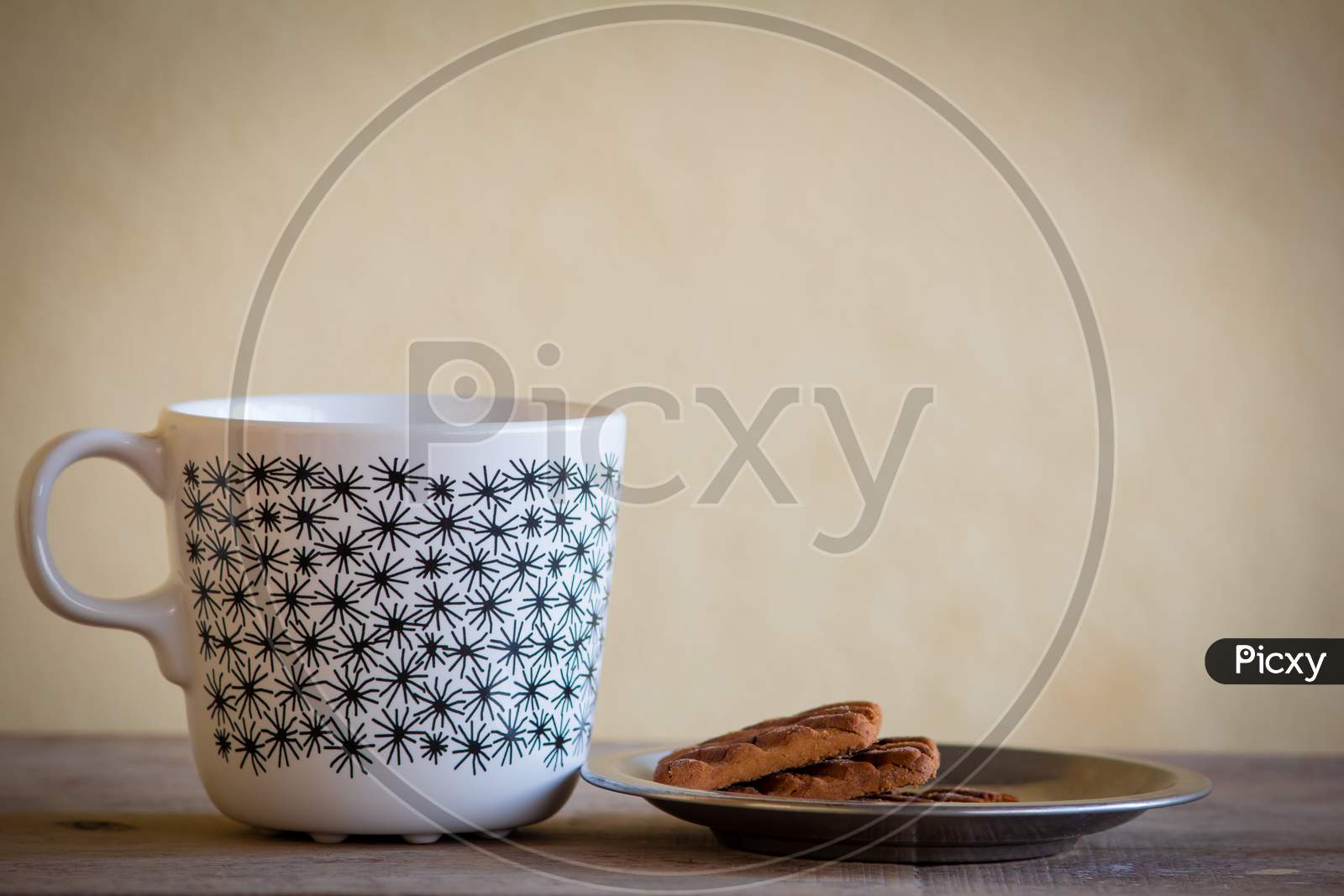Mug With Coffee Or Tea Along With Biscuits. Refreshment During The Break From Work. Tea Break From Work