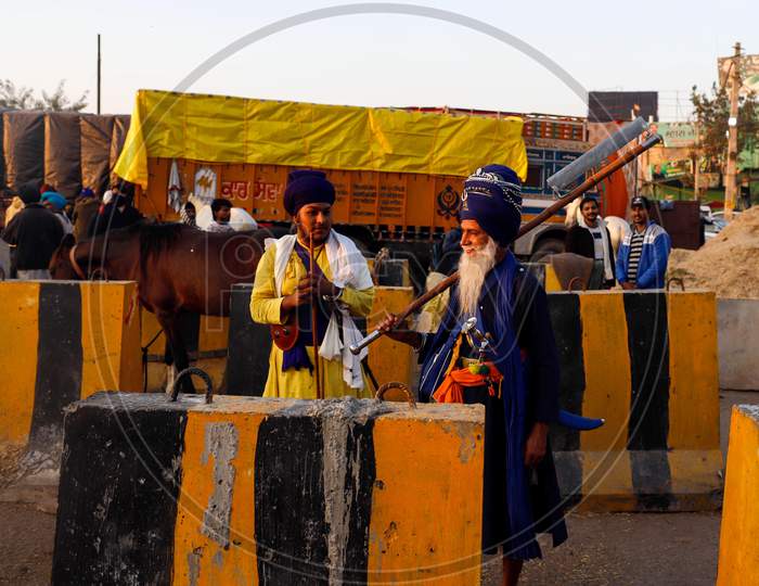 Nihang Sikhs Seen During The Ongoing Sit-In Protest At Singhu Border Against New Farm Laws On December 13, 2020 Near New Delhi, India. Thousands Of Farmers Are Protesting On Various Borders Of The National Capital Since November 26,