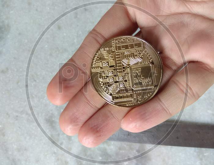 Bitcoin Litecoin Monero Physical Coins Cryptocurrency Back Side View in Palm Hand