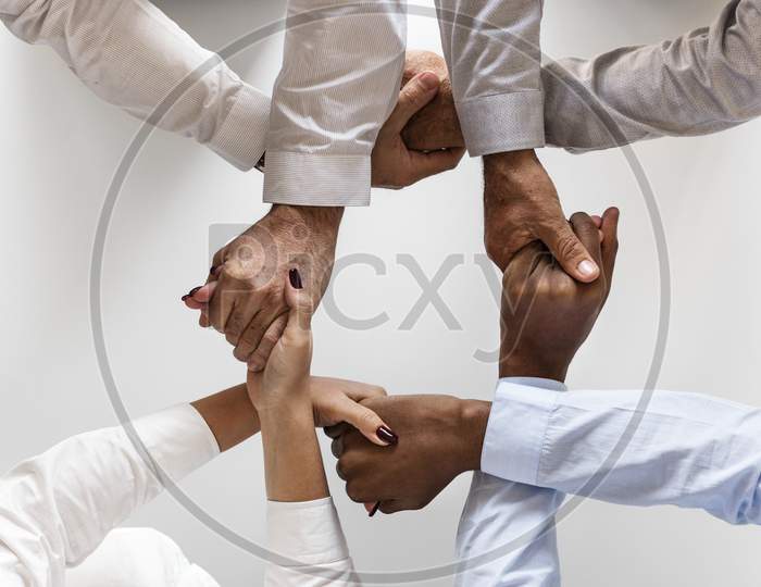Hands Holding Each Other In A Group