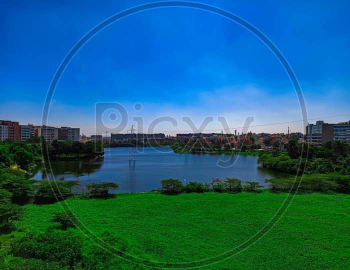 Lake landscape with city view