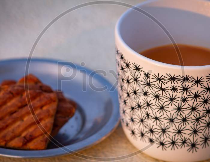 Evening Refreshment With Tea And Biscuits