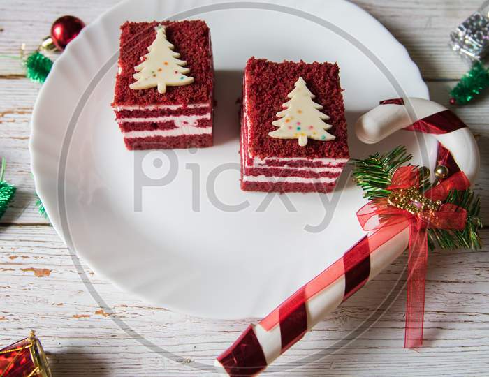 Red velvet Christmas cake on a white plate