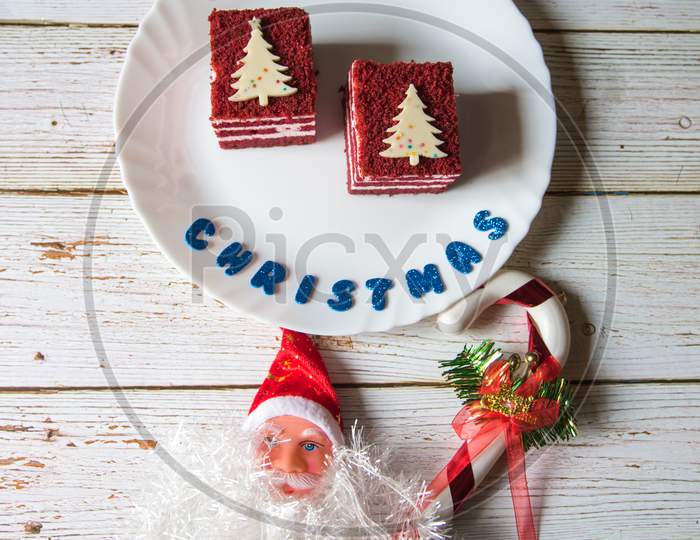 View from top of Christmas tree pattern decoration on red velvet cake in a plate