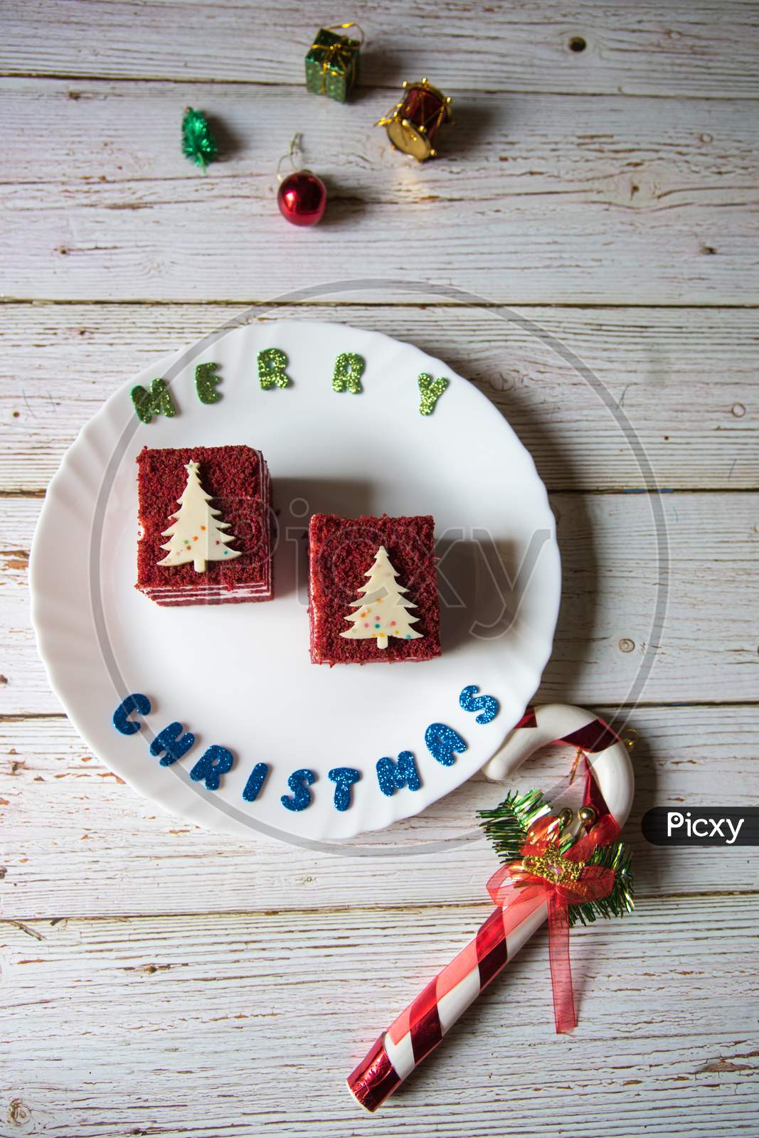 Merry Christmas greetings and red velvet cake