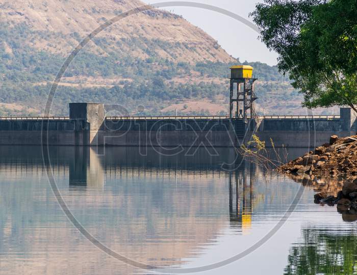 Panoramic View Of Panshet Dam Wall With Trees Located In Pune, Maharashtra, India