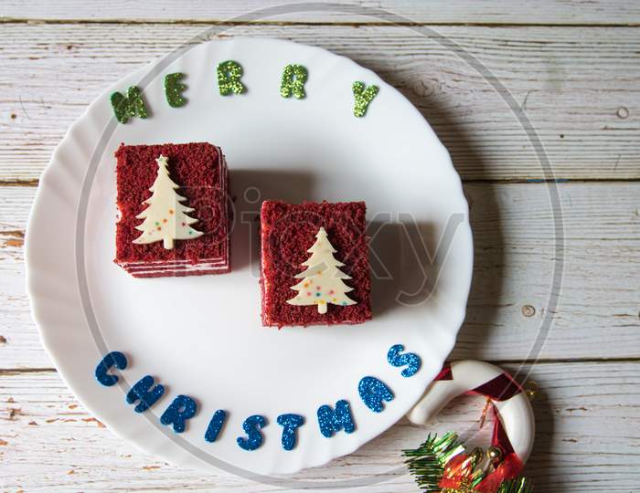 Merry Christmas greetings and red velvet cake