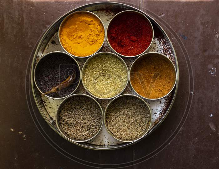 India Spices And Herbs In Steel Bowl