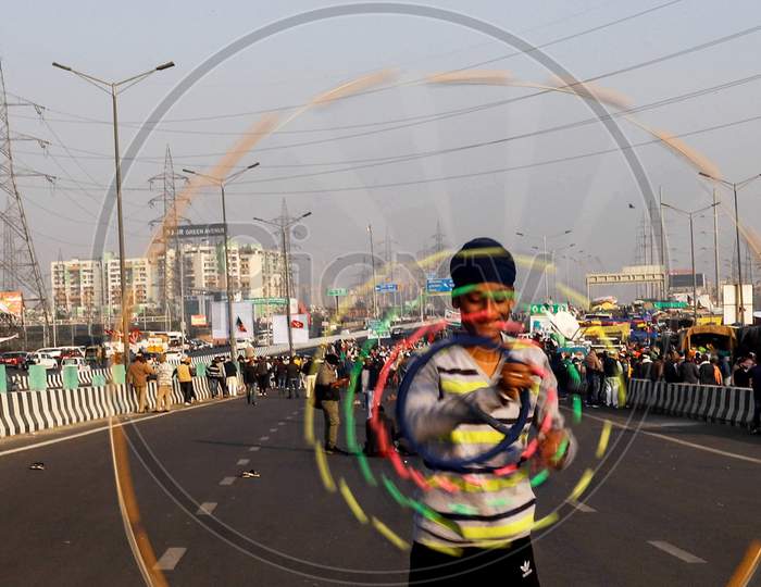 A Boy Performs The Gatka, A Traditional Form Of Martial Art,  On A Blocked National Highway At Gazipur Border Near New Delhi, On December 17, 2020, During An Ongoing Sit-In Protest Demanding The Rollback Of 3 Government Agricultural Reforms Bill.