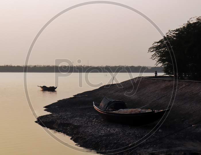 Boats in Matla river at Canning, West Bengal near Sundarban Mangrove forest .
