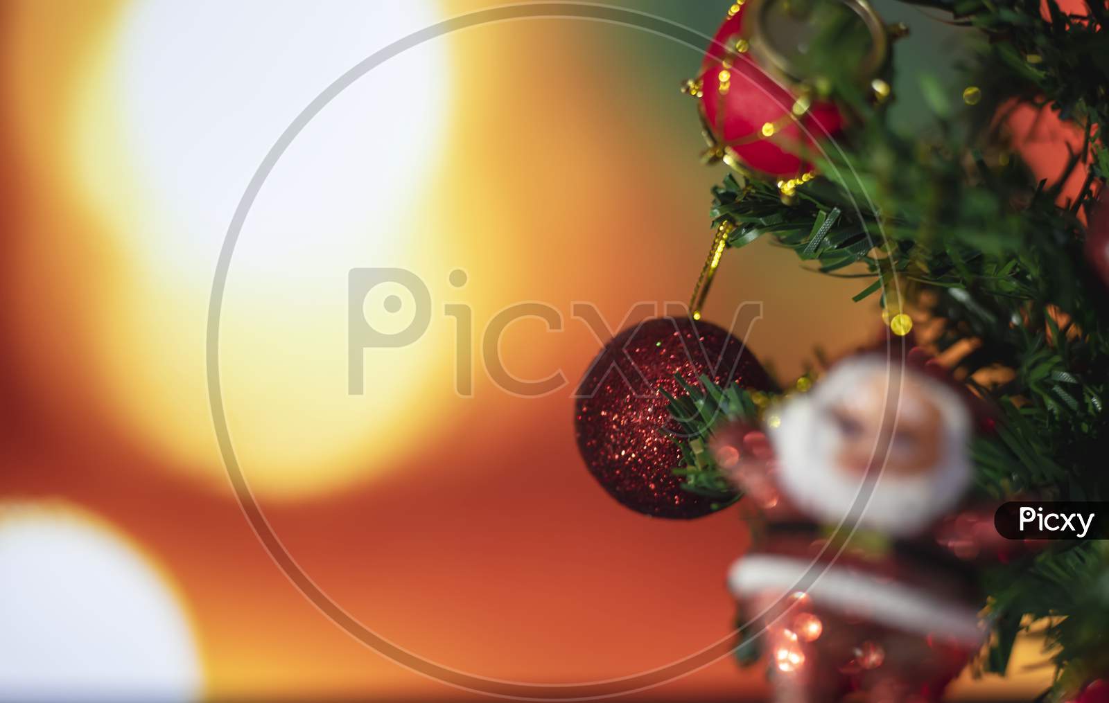 Decorated Christmas Tree On Blurred Background.