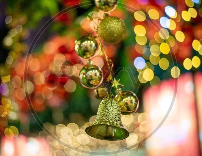 Christmas Bell Decoration In Blur Background