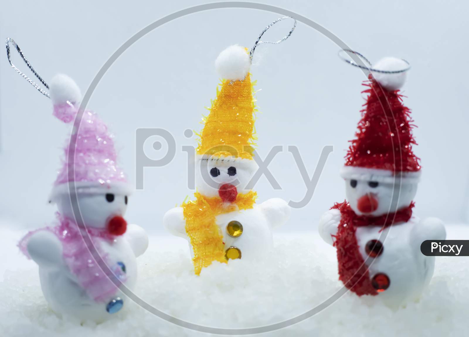 Merry Christmas And Happy New Year Greeting Card With Copy-Space.Many Snowmen Standing In Winter Christmas Landscape.Winter Background