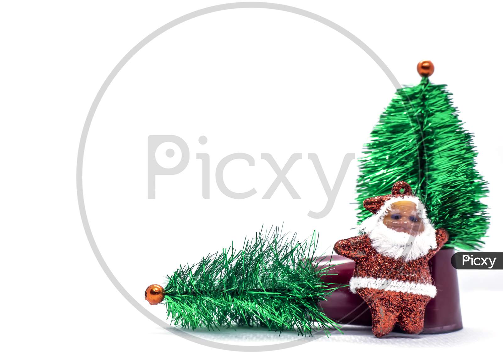 Christmas Concept. Miniature Christmas Tree With Santa Claus On White Background. 2021 New Year.