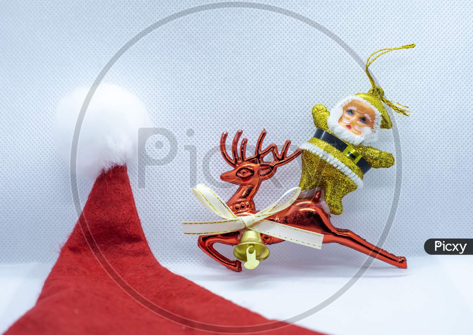 Santa Claus Hat With Santa Claus On A Deer Traveling On A White Background