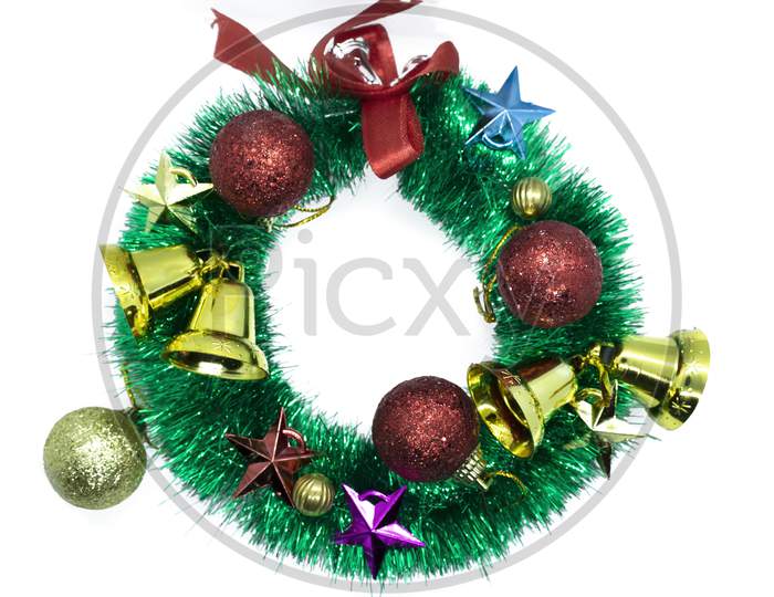 Christmas Wreath With Decorations Isolated On White Background