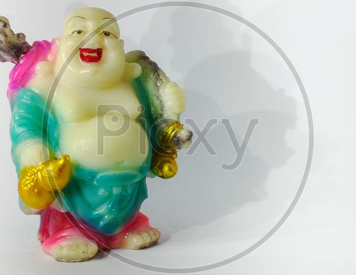 Statue Of Laughing Buddha In White Isolated Background
