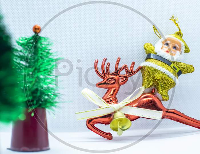 Santa On A Reindeer Traveling In The Forest