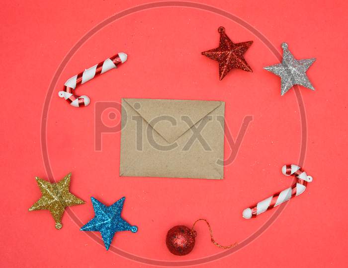 Christmas Background With Gift Boxes, Clews Of Rope, Paper'S Rools And Decorations On Red. Preparation For Holidays. Top View With Copy Space.