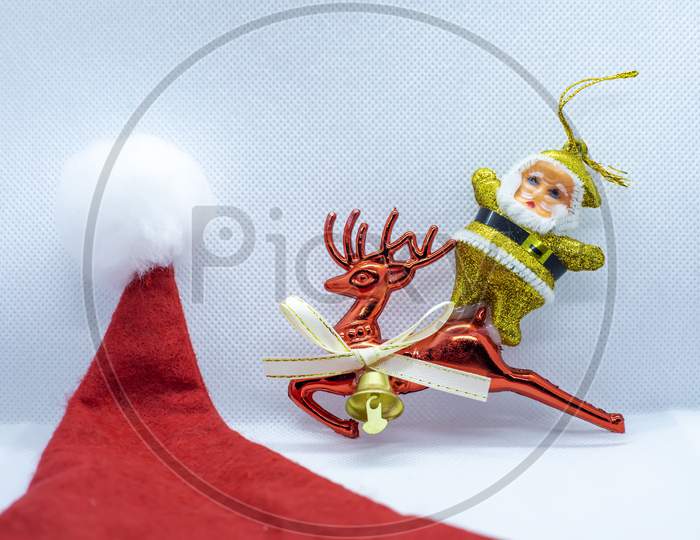 Santa Claus Hat With Santa Claus On A Deer Traveling On A White Background