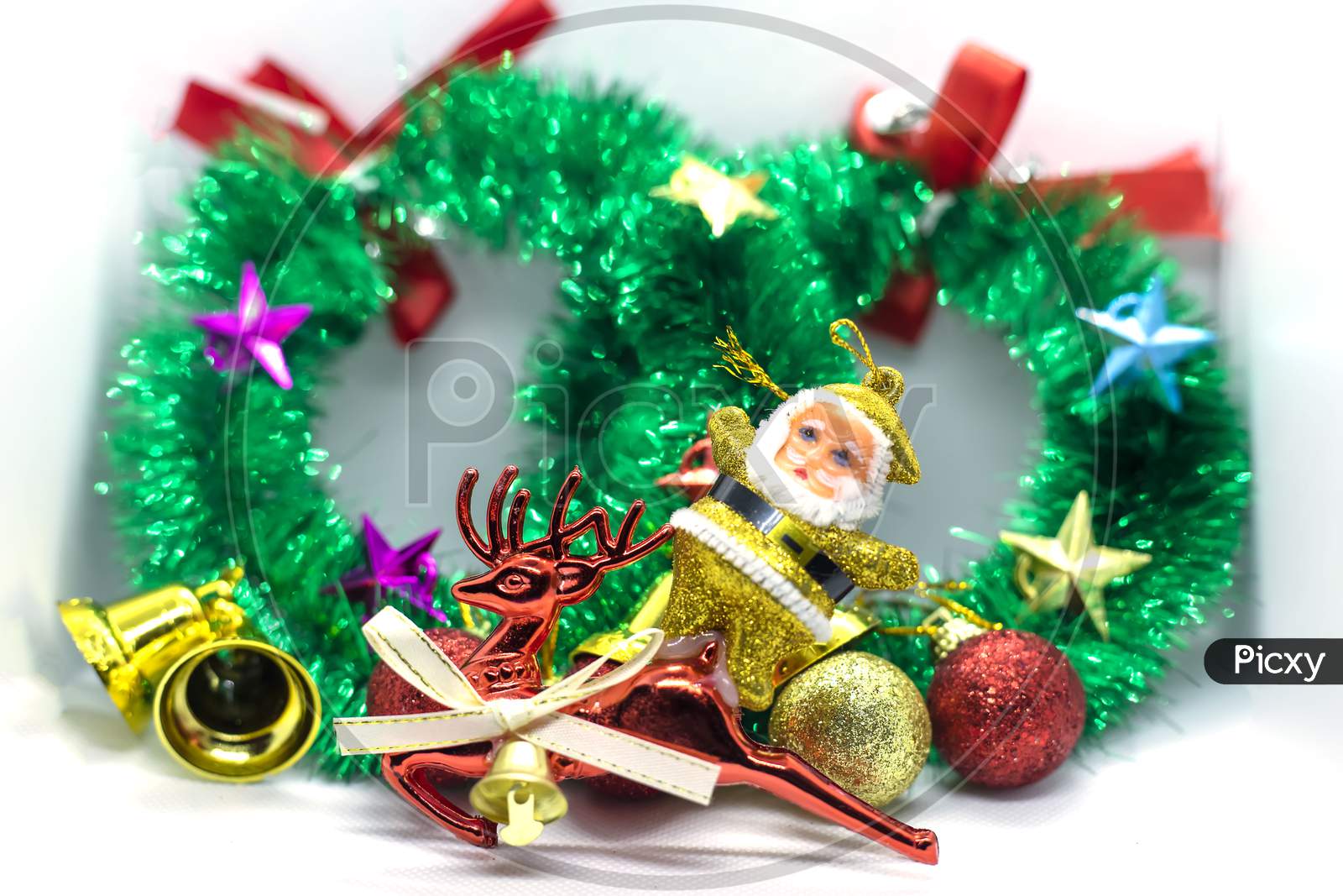 Santa On A Reindeer With A Christmas Wreath Decorated With Ornaments Background
