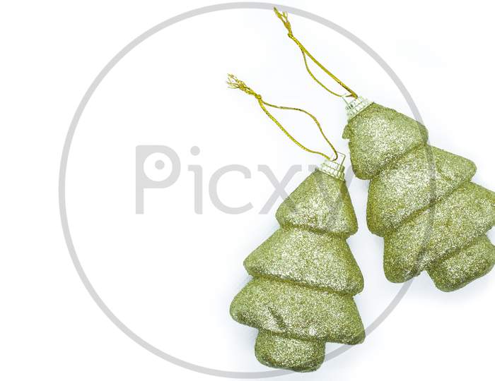 Golden Christmas Tree Decorations Are Isolated On A White Background